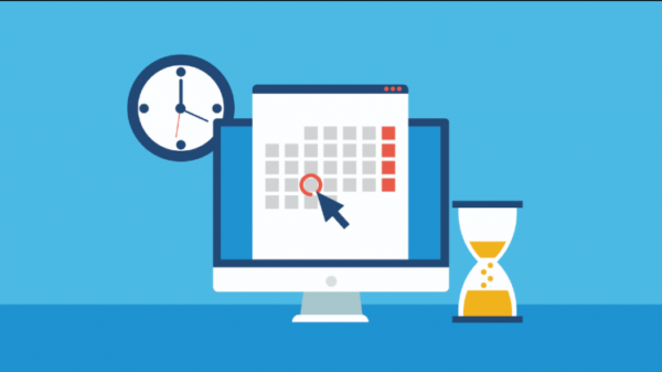 calendar, clock, and hourglass in front of a computer