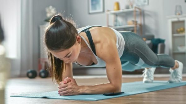 a photo of a woman doing a plank a photo of a woman doing a plank