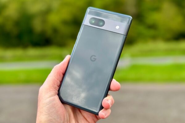 The Google Pixel 7a in a person