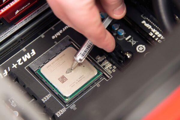Thermal paste application on CPU. Thermal paste application on CPU.