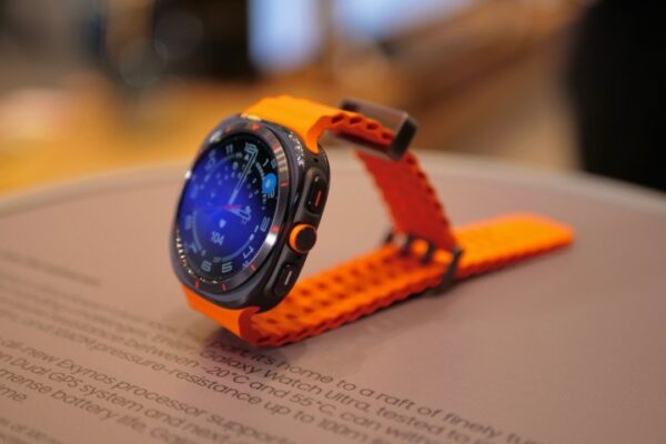 The Samsung Galaxy Watch Ultra in black with an orange strap. The Samsung Galaxy Watch Ultra in black with an orange strap.
