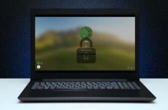 Ноутбук с Windows на экране входа и значком замка