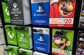 Подарочные карты для Xbox, PlayStation и Nintendo на подставке.
