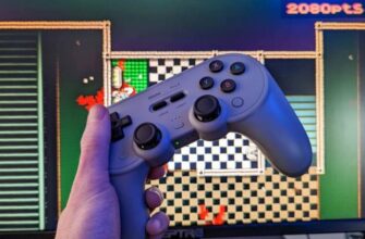 8Bitdo Pro 2 wireless controller with a computer monitor
