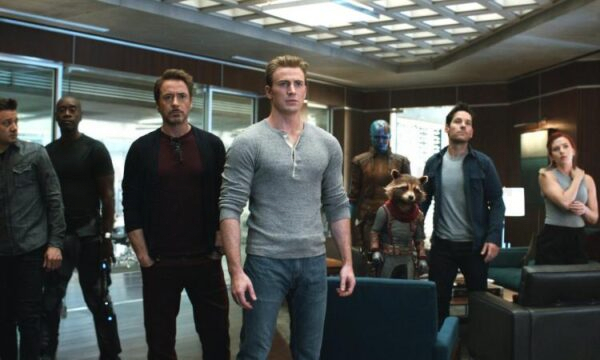 The Avengers assemble in a board room in Endgame.
