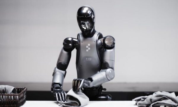 Figure's humanoid robot folding towels.