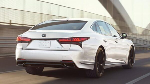 Dynamic rear 3/4 shot of a white 2025 Lexus LS 500.