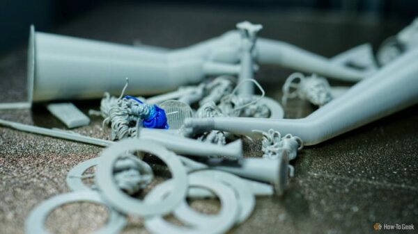 3D printer filament poop on a Bambu Lab P2S print bed.