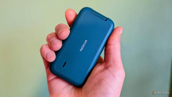 Nokia flip phone in hand