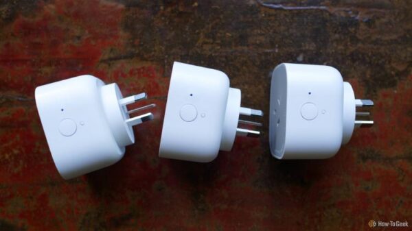 Three IKEA smart plugs in a row.