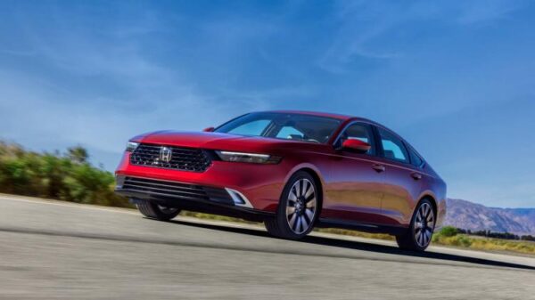 Front 3/4 action shot of a 2023 Honda Accord 