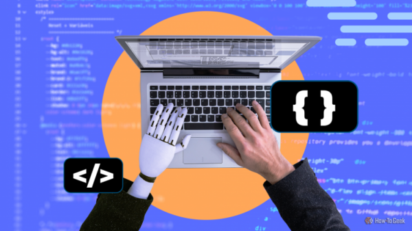 A robot hand and a human hand typing together on a laptop keyboard, with coding symbols and a blurred code background.