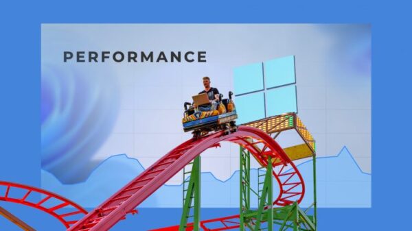 Man using a laptop on a roller coaster with a Windows performance graph in the background.