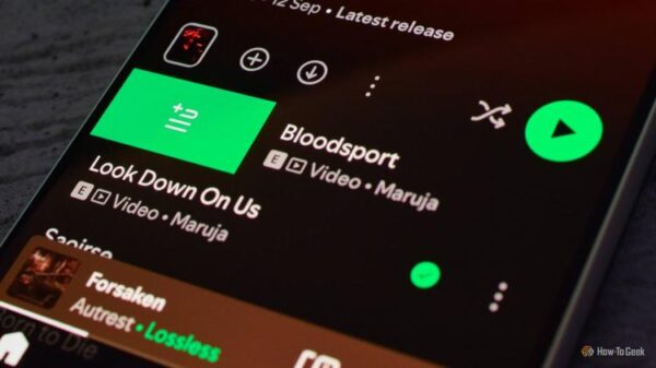 A photo showing Spotify's Swipe to Queue feature in action. 