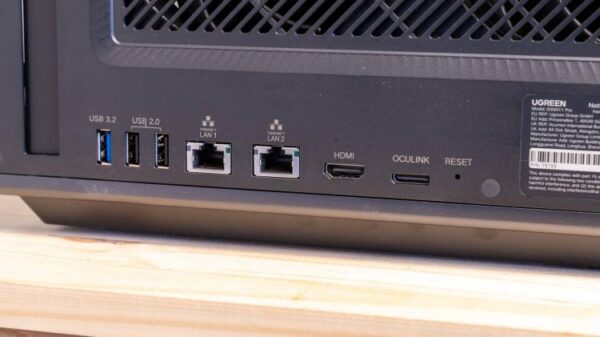 The rear IO panel of the Ugreen iDX6011 Pro NAS showing USB, dual 10GbE LAN, HDMI, and OCuLink ports.
