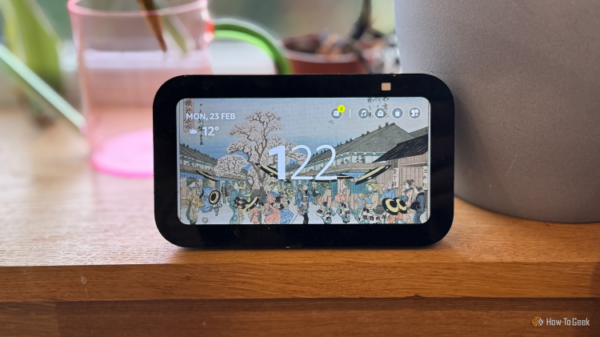 An Echo Show 5 on a kitchen windowsill.