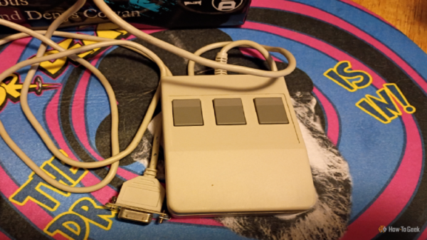 Feature image of a 1985 C7 Logitech computer mouse amid a workshop