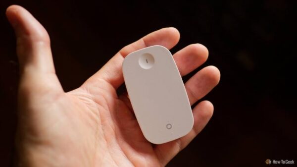 IKEA Rodret Zigbee remote in a hand.